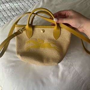 Yellow woven mini longchamp le panier pliage bag